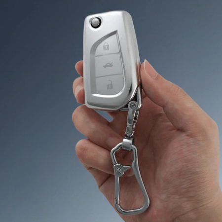 keycare Silver Dust TPU key cover And keychain for Innova Crysta, Corolla Altis 3 button flip key | SDTP 42, SDTP Keychain keycare Silver Dust TPU key cover And keychain for Innova Crysta, Corolla Altis 3 button flip key | SDTP 42, SDTP Keychain